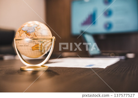Desk globe and meeting 137577527