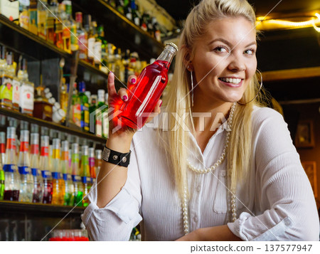 Woman working at the bar counter Woman working at the bar counter 137577947