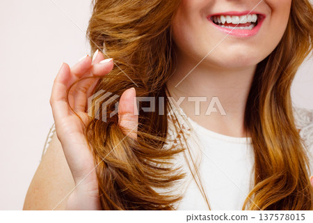Woman long healthy brown hair ends, detail view Woman long healthy brown hair ends, detail view 137578015