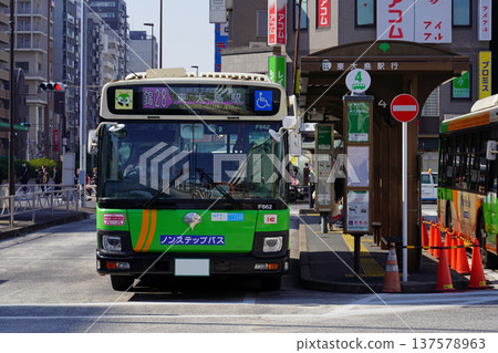 Toei bus (one main bus) waiting to depart in front of JR Kinshicho Station Toei bus (one main bus) waiting to depart in front of JR Kinshicho Station 137578963