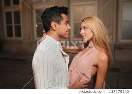 Romantic evening between couple in a charming outdoor setting 137579390