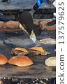 Hamburgers cooked on a hot plate 137579625