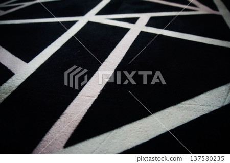 Abstract Black Carpet Pattern With White Geometric Lines 137580235