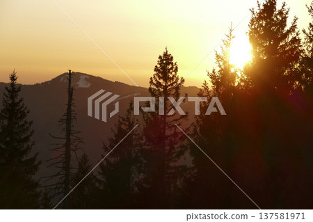 Sunset at Rechelberg mountain in wintertime, Bavaria, Germany Sunset at Rechelberg mountain in wintertime, Bavaria, Germany 137581971