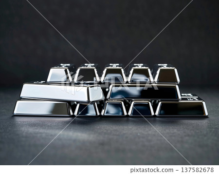 Stacked silver ingots 137582678