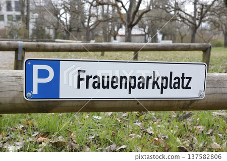 Designated women's parking space 137582806