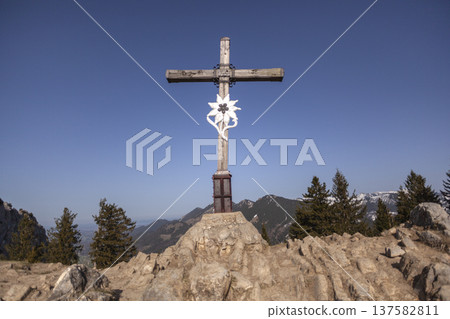 Summit cross at Heuberg mountain tour in springtime Summit cross at Heuberg mountain tour in springtime 137582811