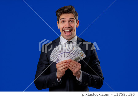 Happy Excited Businessman With Cash Money - Usd Currency Dollars Banknotes Happy Excited Businessman With Cash Money - Usd Currency Dollars Banknotes 137583186