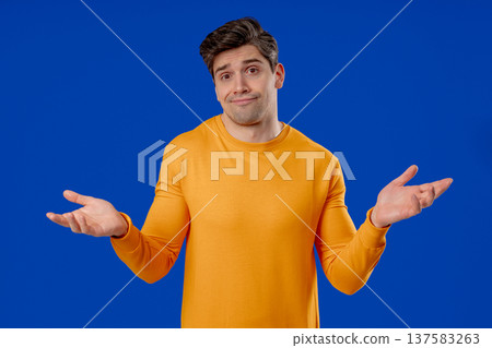 Mature Man Shrugs Shoulders Showing Uncertainty, Confusion, Dilemma, Hesitation 137583263