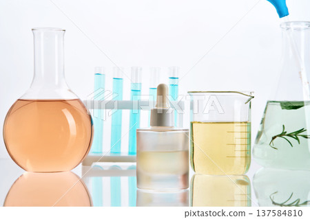 Scientific laboratory glassware with colorful liquids for research Scientific laboratory glassware with colorful liquids for research 137584810