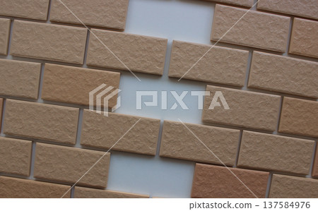Three same empty niches in even rows of wall tiles with imitation bricks. Stock image for illustration of home renovation Three same empty niches in even rows of wall tiles with imitation bricks. Stock image for illustration of home renovation 137584976