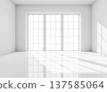 Empty white room interior with large windows and bright morning sunlight falling on the glossy floor for modern minimalist office or home interior mockup. 137585064