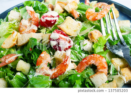 Caesar salad, with shrimp, on a marble background, top view, no people, Caesar salad, with shrimp, on a marble background, top view, no people, 137585203