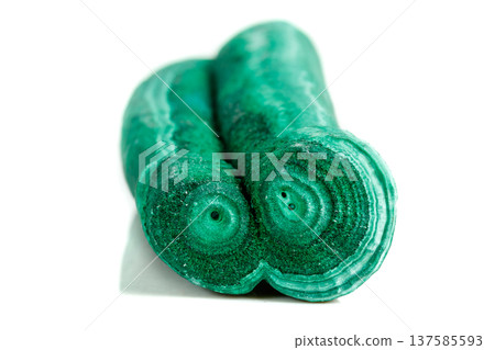 Macro mineral stone malachite stalactite on white background Macro mineral stone malachite stalactite on white background 137585593