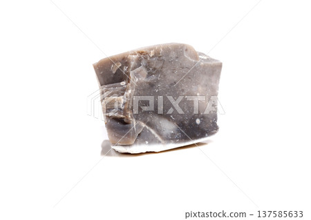 Macro mineral stone Flint in the rock on a white background 137585633