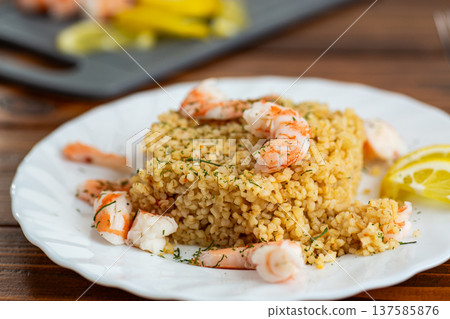 tasty bulgur with shrimp herbs and lemon tasty bulgur with shrimp herbs and lemon 137585876