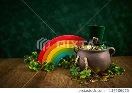 St. Patrick's day pot of gold with shamrocks and leprechaun hat St. Patrick's day pot of gold with shamrocks and leprechaun hat 137586076