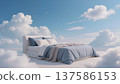 Gentle daylight, a clear blue sky, and voluminous white clouds around the bed form a light, dreamy atmosphere of romance and tranquility, while the open areas of sky and clouds provide enough copy 137586153
