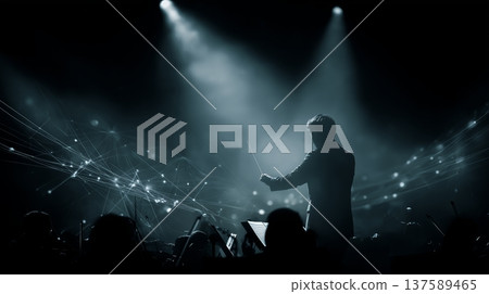 Conductor guides digital symphony with technology and music in dark auditorium 137589465