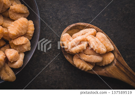 Rustic tomato Gnocchi in spoon Ready to Cook Comforting Italian Pasta Dish Rustic tomato Gnocchi in spoon Ready to Cook Comforting Italian Pasta Dish 137589519