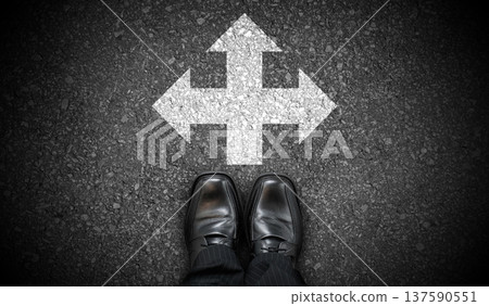 Black business shoes and chalky arrows in three directions on asphalt - choice concept Black business shoes and chalky arrows in three directions on asphalt - choice concept 137590551
