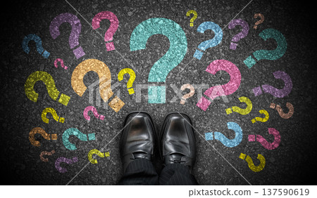 Black business shoes and many colorful question marks - doubt concept Black business shoes and many colorful question marks - doubt concept 137590619