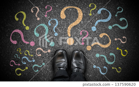 Black business shoes and many colorful question marks - doubt concept Black business shoes and many colorful question marks - doubt concept 137590620