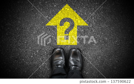 Black business shoes, yellow forward arrow and and question mark - problem concept Black business shoes, yellow forward arrow and and question mark - problem concept 137590622