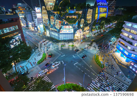 Tokyo, Japan - Oct 15 2024, panoramic aerial view of tokyu Plaza Harajuku "Harakado" and the intersection in front of it, at night with illumination, Tokyo, Japan 137590698