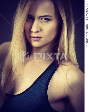 Beautiful woman having serious face expression Beautiful woman having serious face expression 137590757