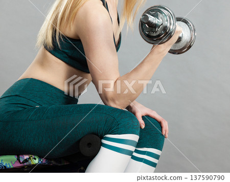 Woman training weight lifting 137590790