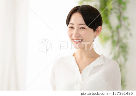A smiling middle woman 137591480