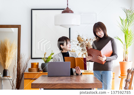 Businesswoman working in a stylish office Businesswoman working in a stylish office 137592785