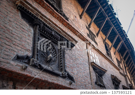 Beautiful peacock window also referred to as the Mona Lisa of Nepal adorns the Pujari Math in Bhaktapur, Nepal. 137593121