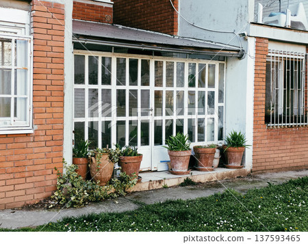 Backyard terrace in residential house 137593465
