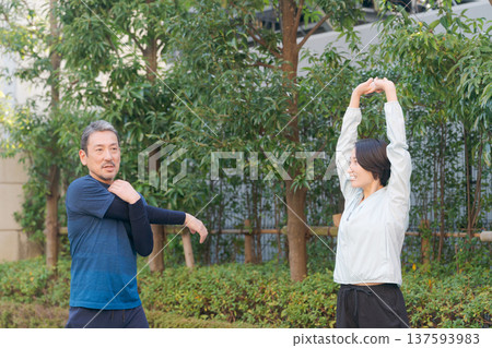 Middle couple stretching 137593983