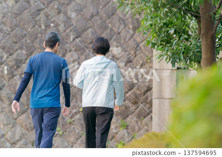 A middle-aged couple walking A middle-aged couple walking 137594695