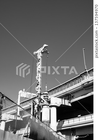 Ikebukuro under redevelopment, heavy machinery and the Metropolitan Expressway 2026.02 b-6 monochrome Ikebukuro under redevelopment, heavy machinery and the Metropolitan Expressway 2026.02 b-6 monochrome 137594970