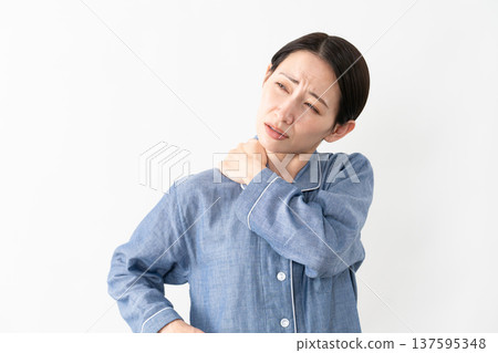 Woman wearing pajamas Lifestyle image 137595348
