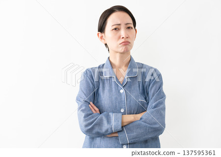 Woman wearing pajamas Lifestyle image Woman wearing pajamas Lifestyle image 137595361