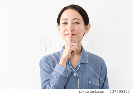 Woman wearing pajamas Lifestyle image Woman wearing pajamas Lifestyle image 137595363