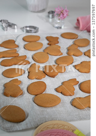 Baking Gingerbread Cookies for Easter Celebration With Bunny Shapes and Other Festive Symbols Baking Gingerbread Cookies for Easter Celebration With Bunny Shapes and Other Festive Symbols 137597697