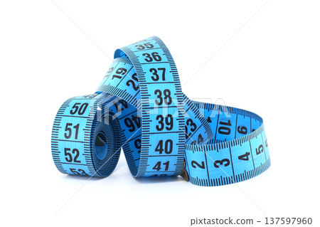 Blue tailor's measuring tape coiled and isolated on a white background 137597960