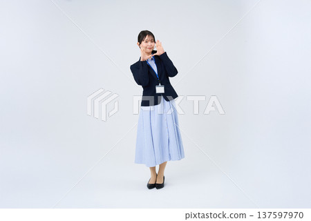 Business woman in a cheering pose Business woman in a cheering pose 137597970