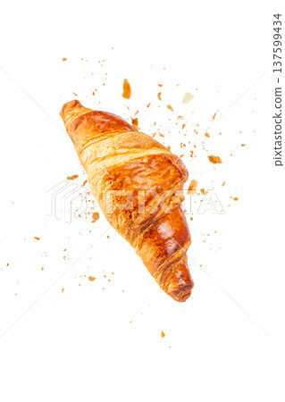 Fresh croissant with crumbs isolated on white background Fresh croissant with crumbs isolated on white background 137599434