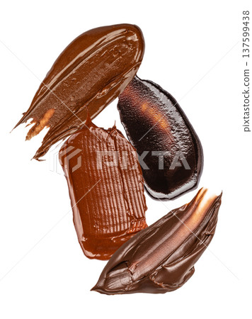 Chocolate spread smears isolated on white background 137599438