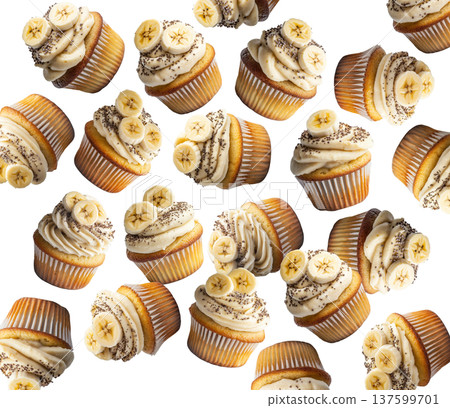 Banana cupcakes topped with cream frosting, banana slices, and chia seeds, isolated on a white background Banana cupcakes topped with cream frosting, banana slices, and chia seeds, isolated on a white background 137599701