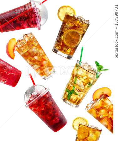 Iced fruit tea and berry drinks in cups and glasses isolated on white background, concept of refreshing beverages Iced fruit tea and berry drinks in cups and glasses isolated on white background, concept of refreshing beverages 137599731