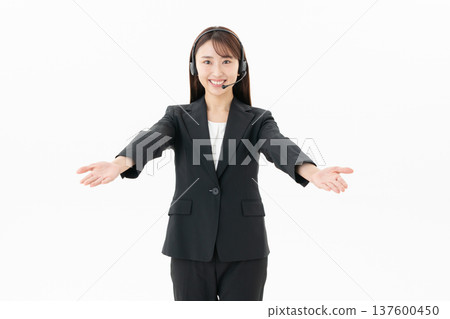 Young female operator on a white background Young female operator on a white background 137600450