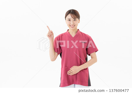 A young female doctor on a white background 137600477